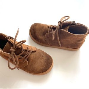 Tan high tops with side zip for easy wear